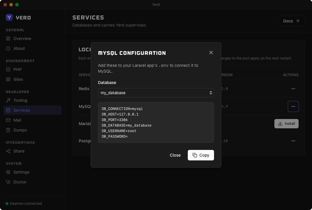 The Configuration dialog for a MySQL database, with copyable .env values