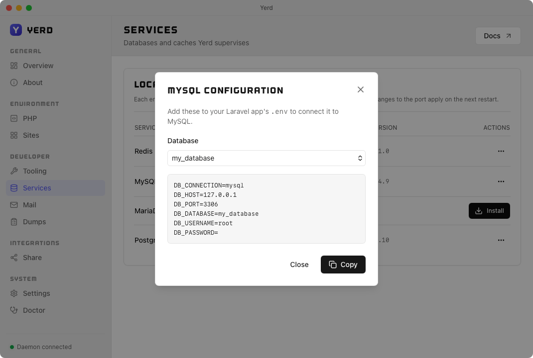 The Configuration dialog for a MySQL database, with copyable .env values